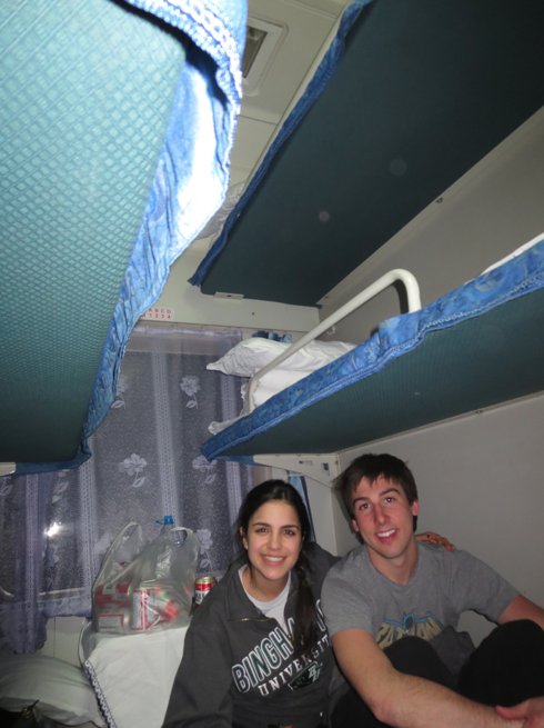 Alyssa and James chillin' on the lower bunk.